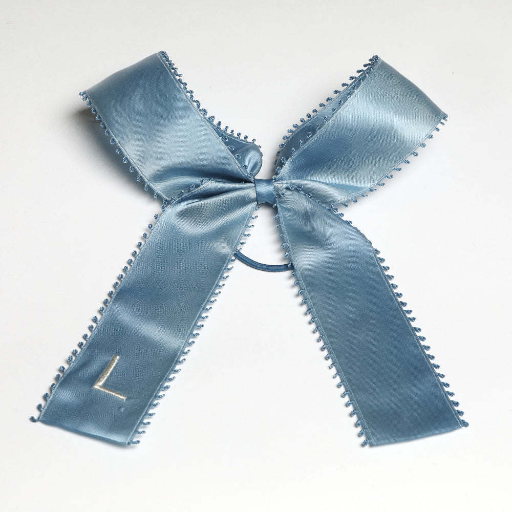 ADD A MONOGRAM TO YOUR BOWS