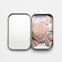 TIN OF BOWS