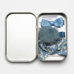 TIN OF BOWS