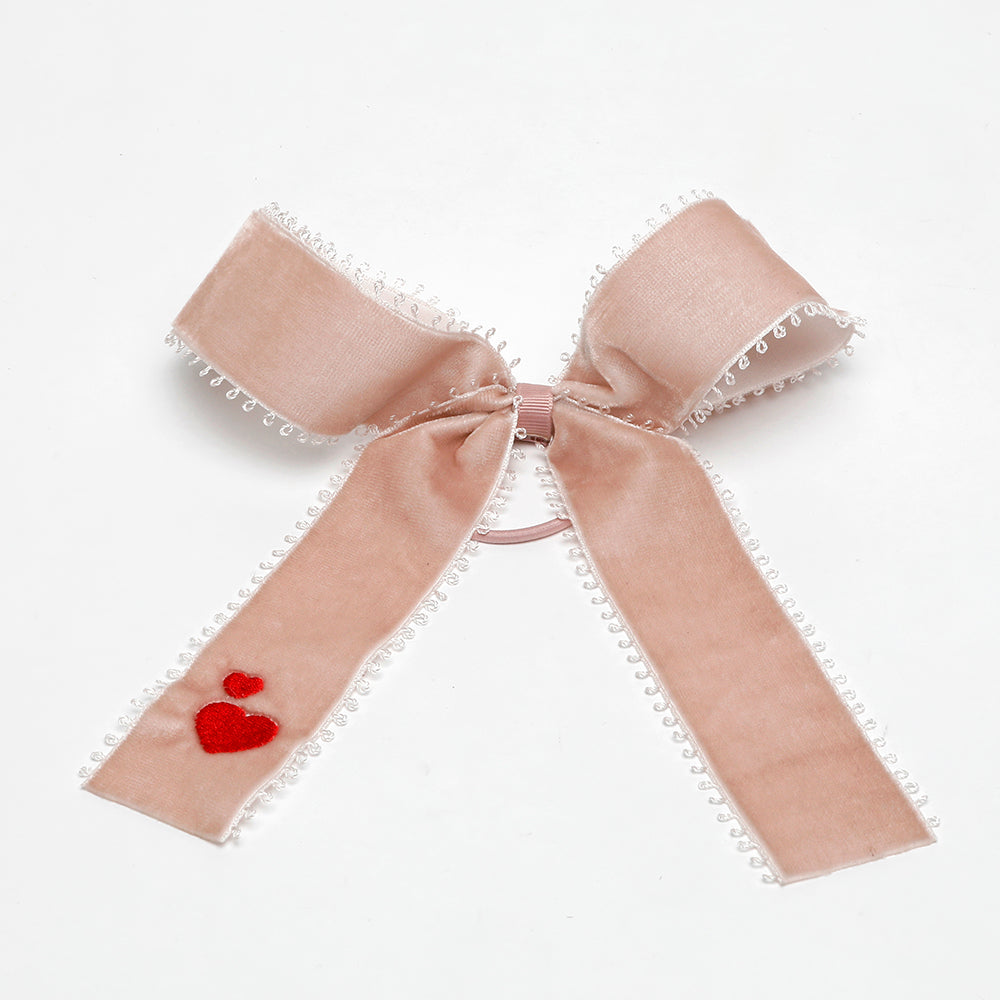 pink velvet bow with red heart
