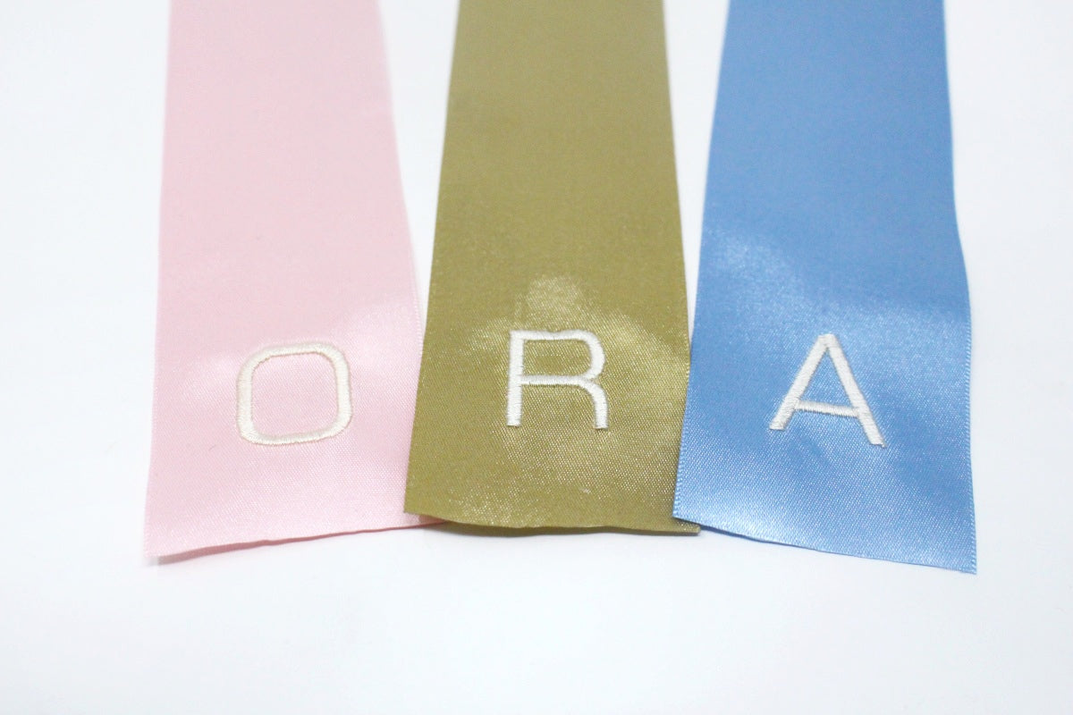 ADD A MONOGRAM TO YOUR BOWS
